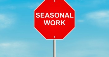 Seasonal work. Road sign on the sky background. Raster illustration.
